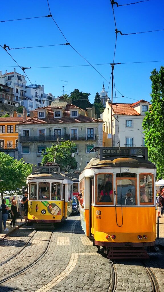 The famous yellow Tram, a mode of transport you'll frequently use after relocating to Lisbon.