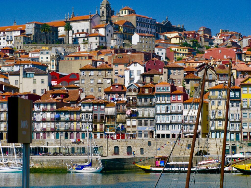 A panoramic view of Ribeira, showcasing its colorful buildings and the Douro river.