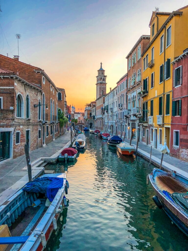 Navigating through Venice's iconic canals, a unique experience when relocating to Italy.