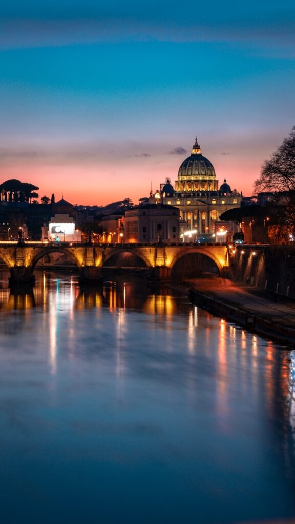 The stunning view of Rome at night, a must-visit city after moving to Italy.